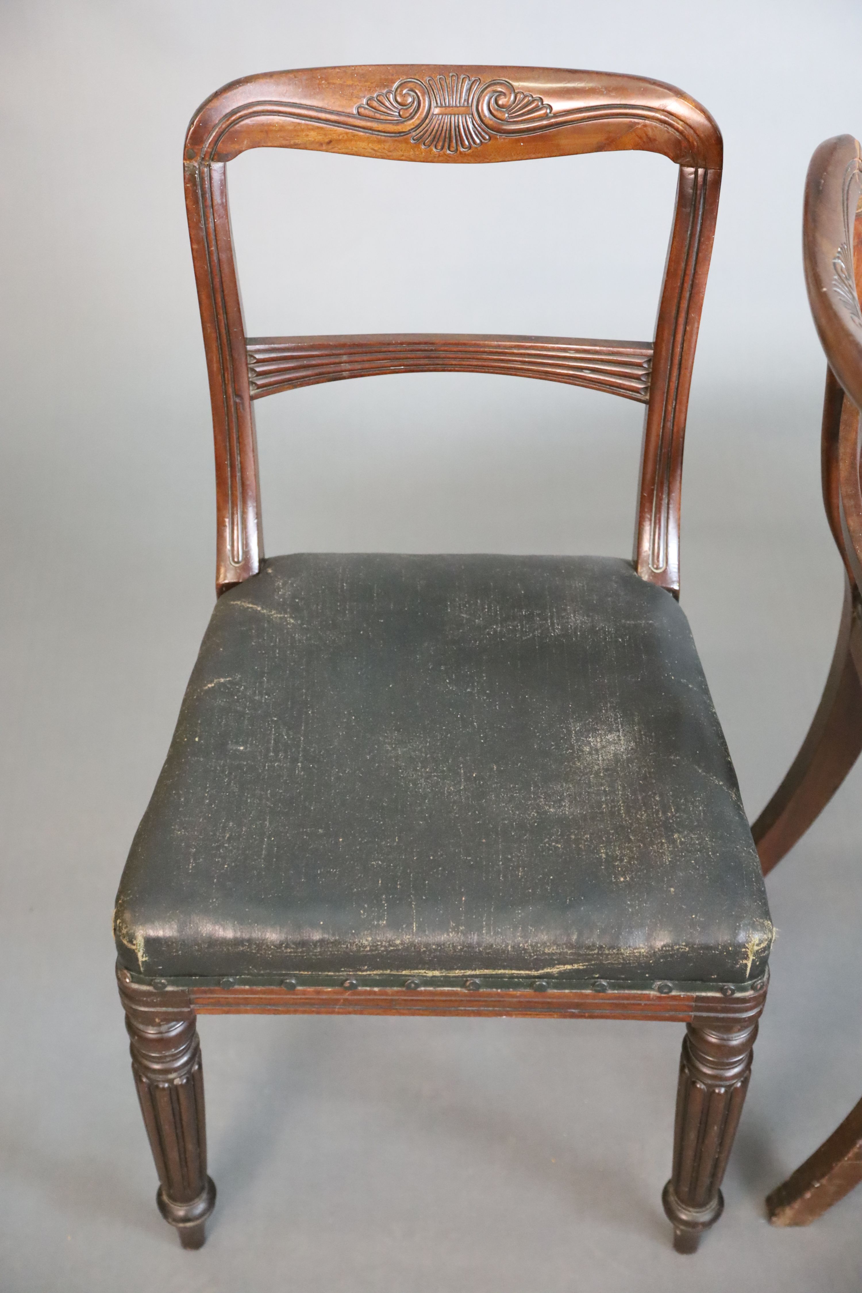 A set of four William IV mahogany buckle back dining chairs, W.48.5cm D.58.5cm H.85cm